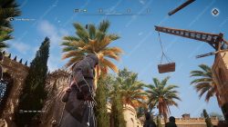 How to go inside the walls surrounding the central Palace in Assassin's Creed Mirage